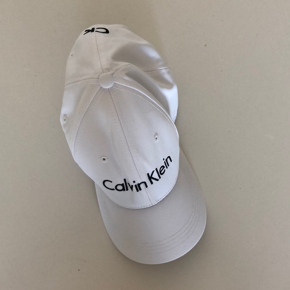 White Calvin Klein baseball cap